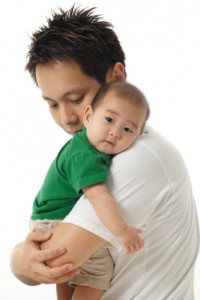 Asian Chinese father with baby